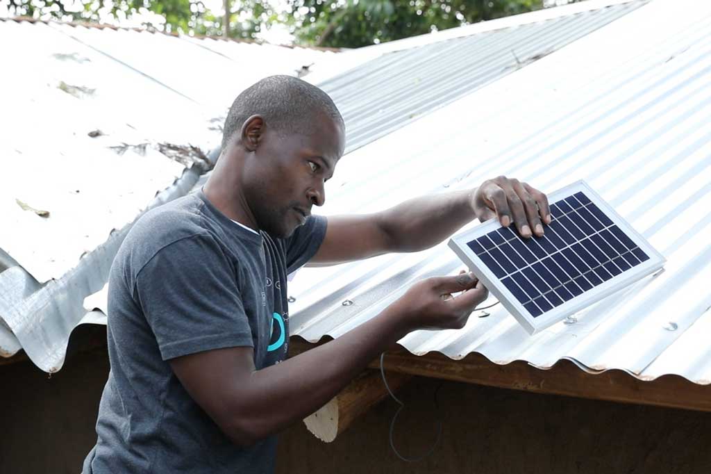 BioLite agent installing a Home 620 system - PAYGo customer repayment